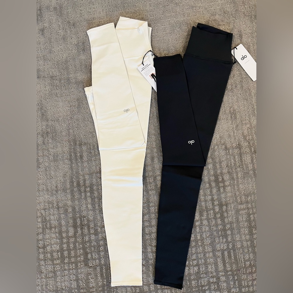 Alo highwasted airbrush.Size med in the dark grey. Medium in ivory 67$ each